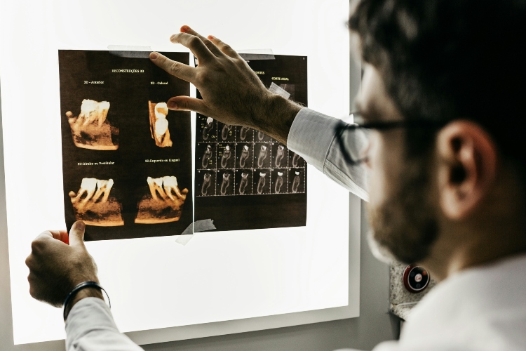 General Dentistry- Dr. Looking at X-Rays